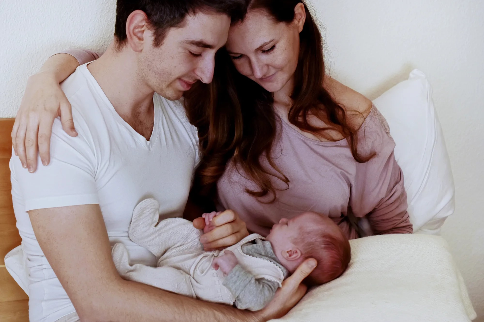 Mother bonding with newborn