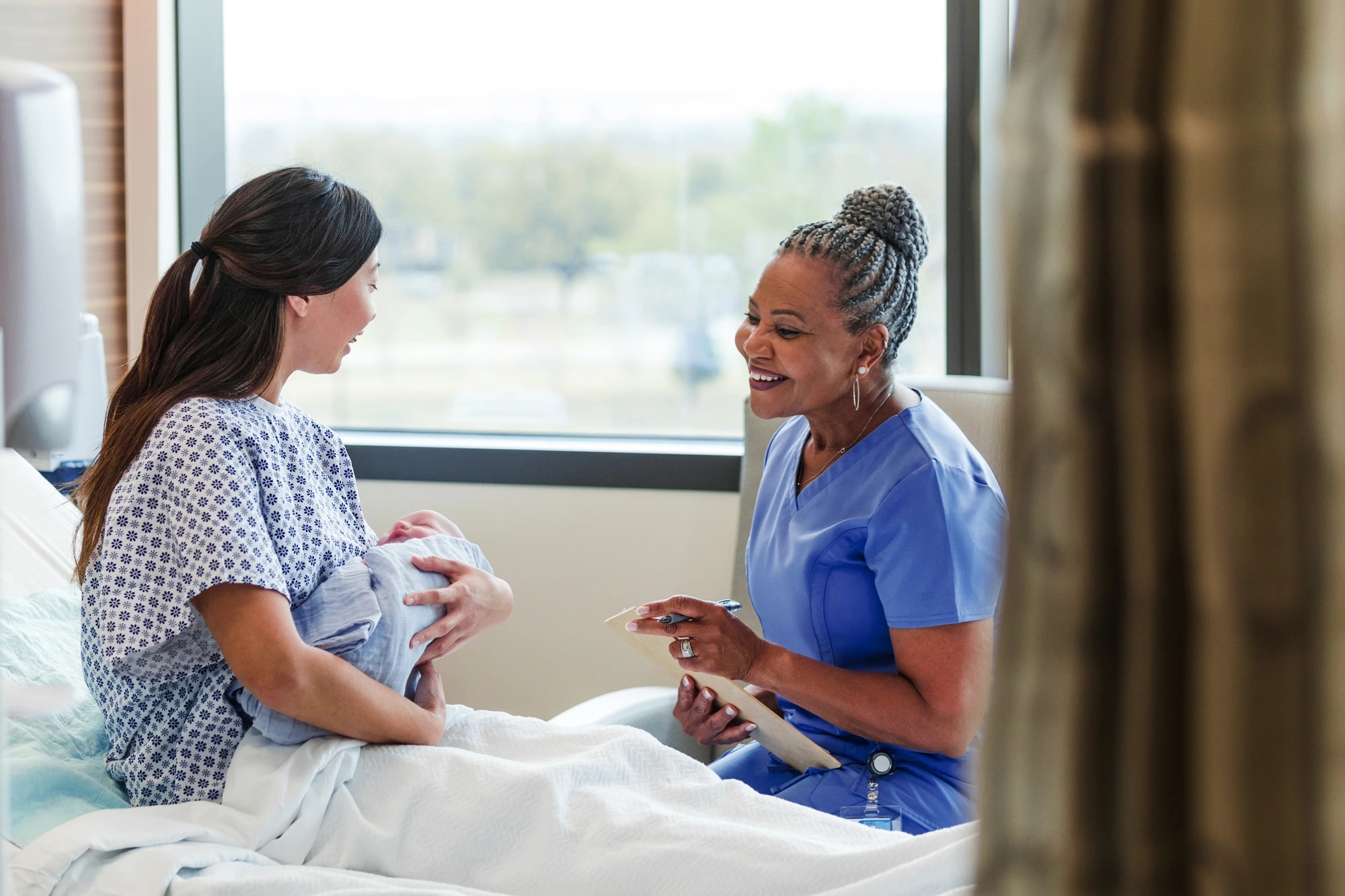 Caregiver supporting birth